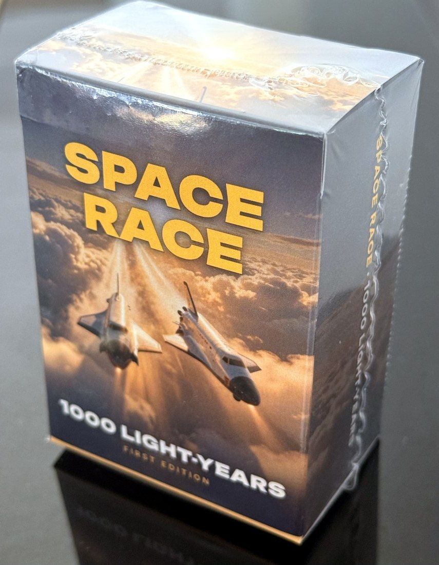 The shrink-wrapped Space Race: 1000 Light-Years tuck box, First Edition